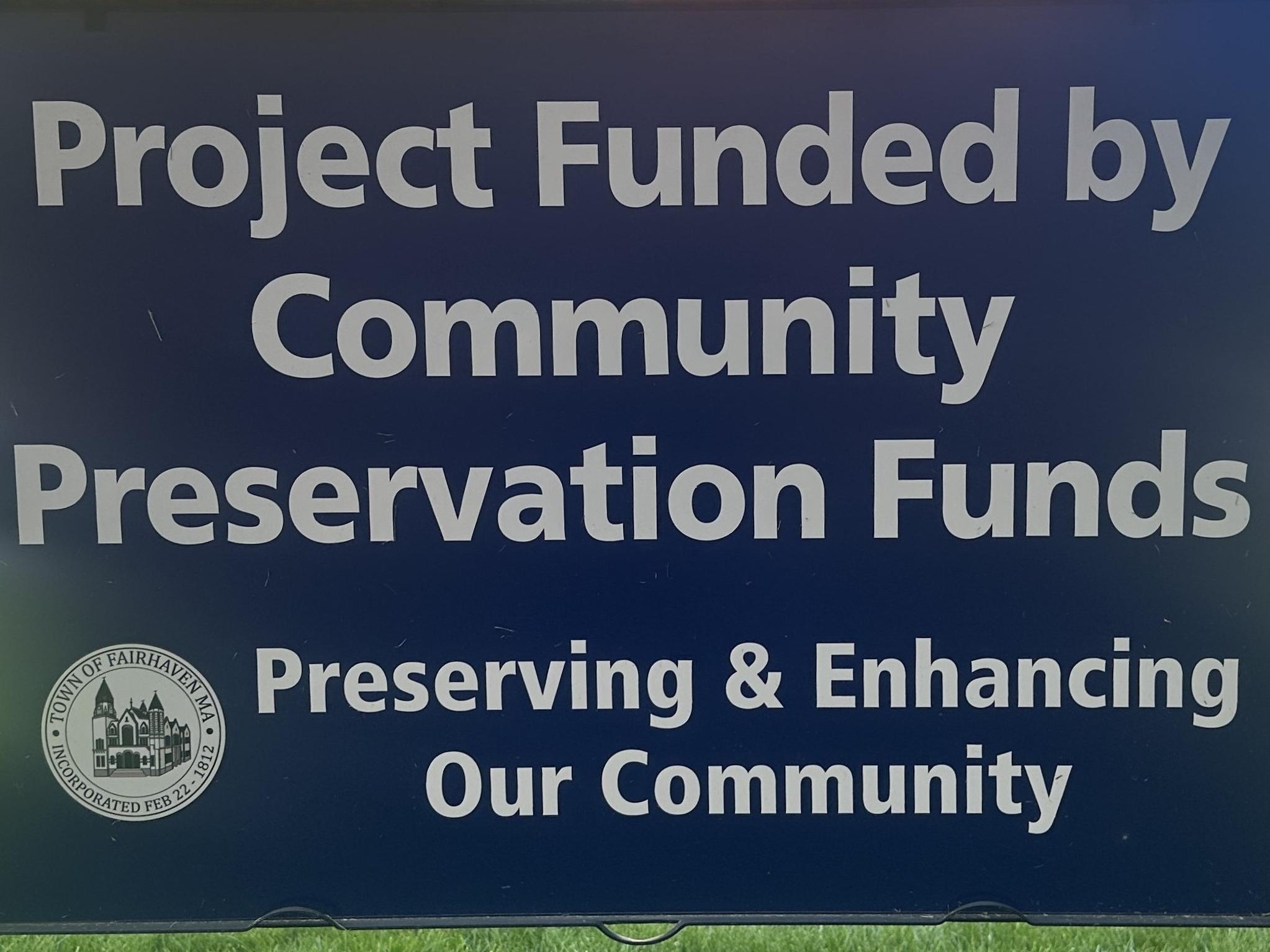 Lawn sign reading Project Funded by Community Preservation Funds. Preserving and Enhancing Our Community